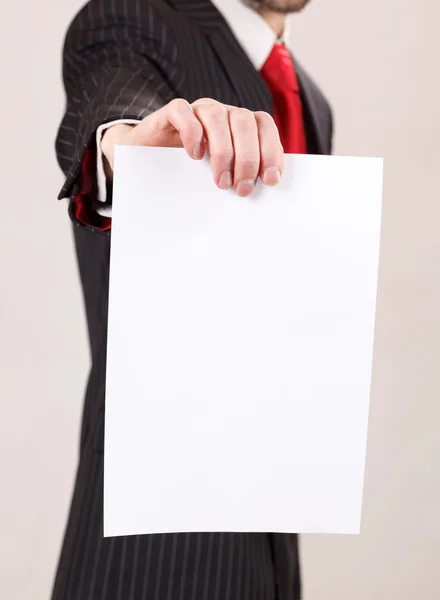 Business man with blank — Stockfoto
