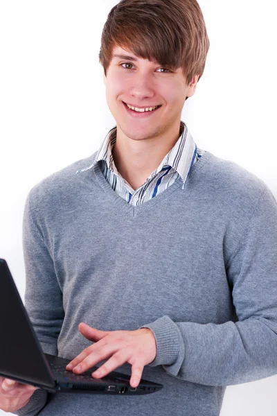 Casual masculino com um laptop — Fotografia de Stock