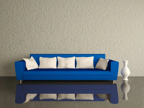 Синий диван с белыми подушками — стоковое фото