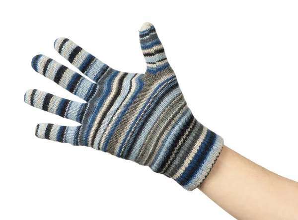 Hand in blauem Wollhandschuh auf weißem Hintergrund — Stockfoto