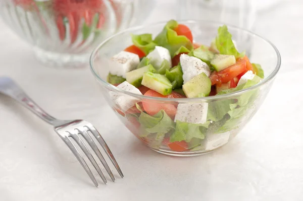 Salad in a glass bowl — Stock Photo, Image