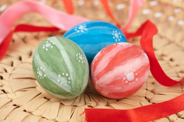 Colorful Easter Eggs in a basket — Stock Photo, Image