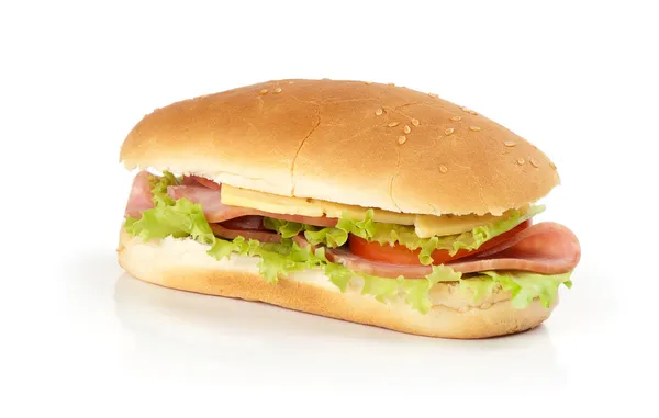 Half of long baguette sandwich with lettuce, tomatoes, and ham — Stock Photo, Image