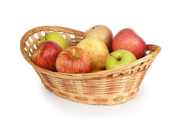 Apples in a basket isolated on white — Stock Photo, Image