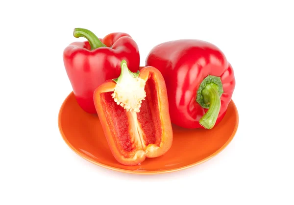 Red sweet pepper on a plate — Stock Photo, Image
