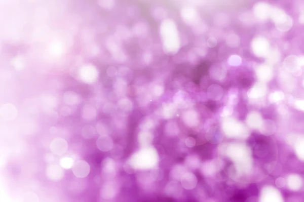 Фиолетовый рождественский фон с огнями боке — стоковое фото