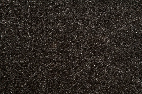 黒いスポンジ表面のテクスチャ — ストック写真
