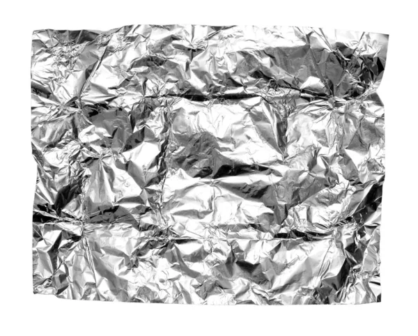 Абстрактная измельченная серебряная алюминиевая фольга крупным планом на белой обратной стороне — стоковое фото