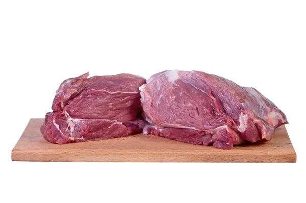 Carne cruda en la tabla de cortar. — Foto de Stock