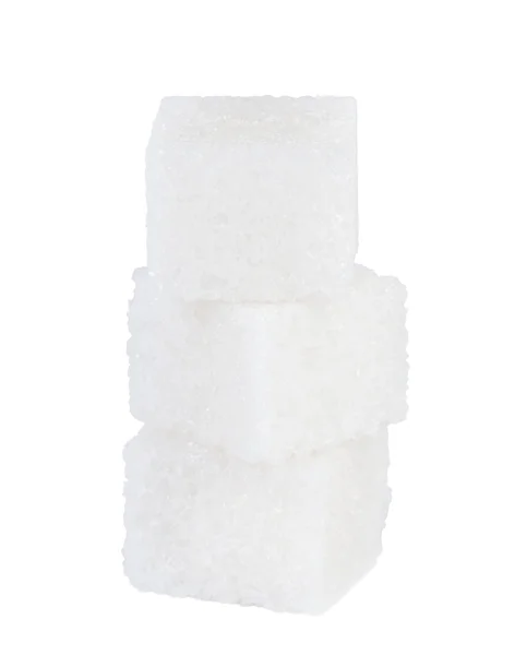 Cubos de açúcar no fundo branco . — Fotografia de Stock