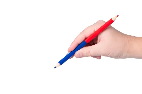 Mano sostiene lápiz de color aislado en blanco . — Foto de Stock