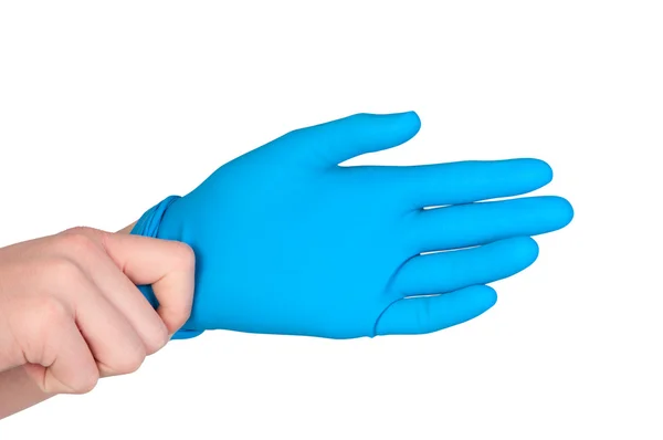 Man wears rubber glove on his hand. — Stock Photo, Image