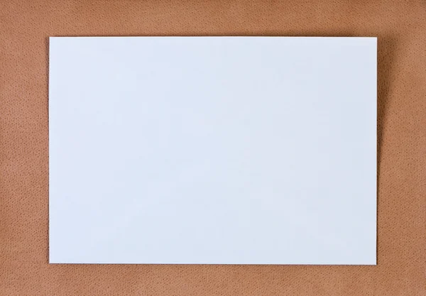 stock image Blank sheet on leather background.