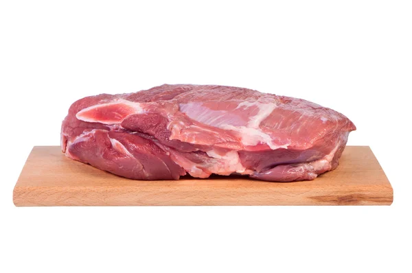 Rohes Fleisch auf einem Brett — Stockfoto