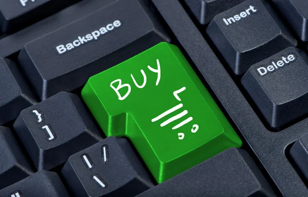 Тележка с кнопкой "купить слово" . — стоковое фото