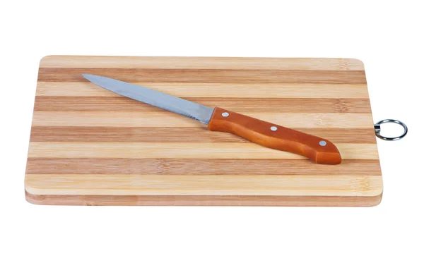 Μαχαίρι κουζίνας σε ένα ξύλο κοπής. — Φωτογραφία Αρχείου
