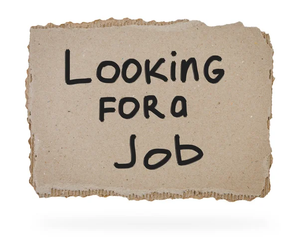 Karton met inscriptie op zoek naar een baan — Stockfoto