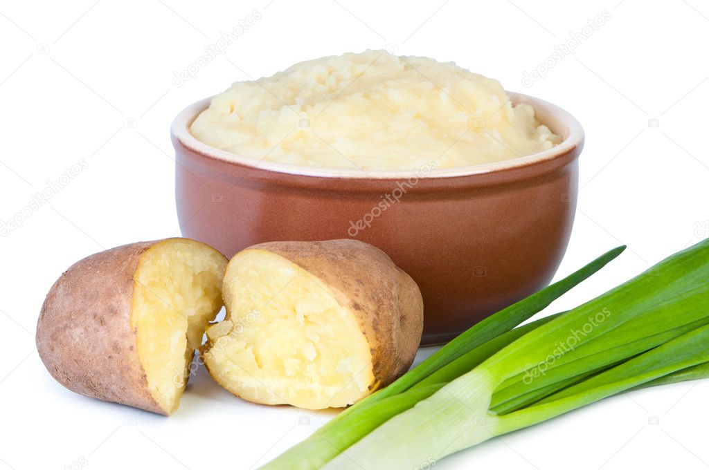 Mashed potatoes with green onions on white background.
