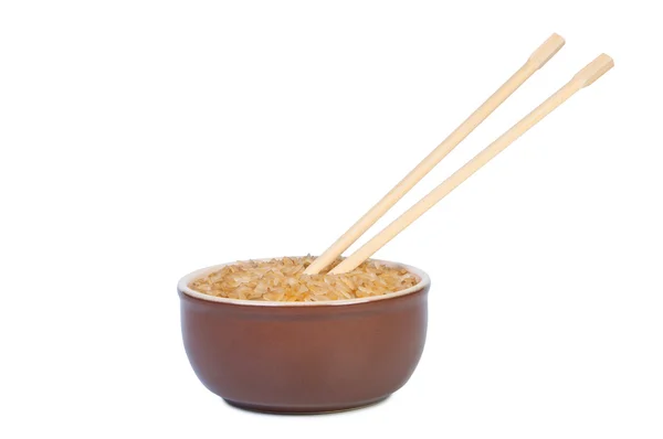 Teller mit Reis und Essstäbchen. — Stockfoto