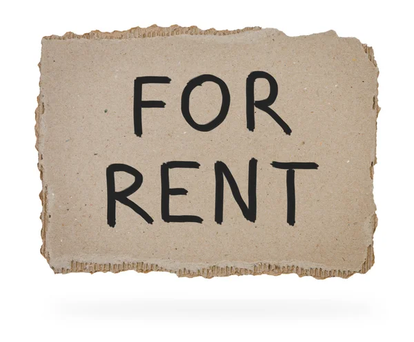 For rent inscription on piece of cardboard. — Stock Photo, Image