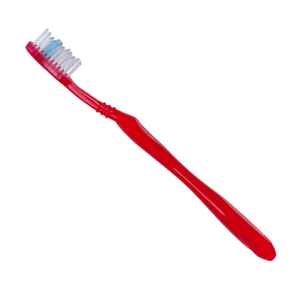 Diş fırçası kırmızı renk beyaz zemin üzerine. — Stok fotoğraf
