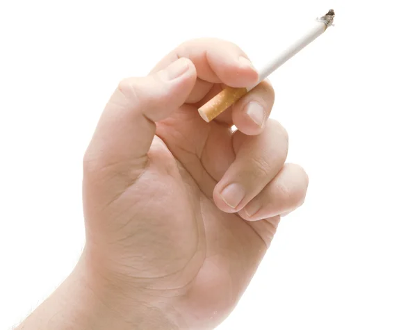 Людська рука тримає цигарку — стокове фото