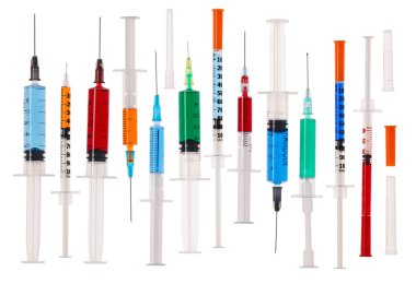 Many multicolor syringes isolated on white clipart