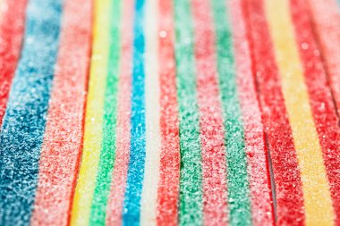 Multicolor gummy candy (licorice) sweets closeup food background clipart