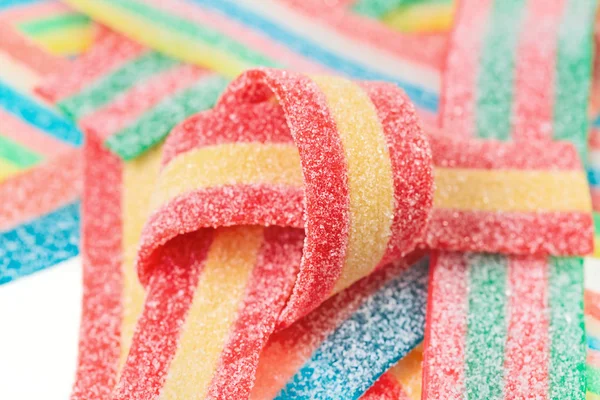 Többszínű nyúlós candy (édesgyökér) édességek Vértes élelmiszer-háttér — Stock Fotó