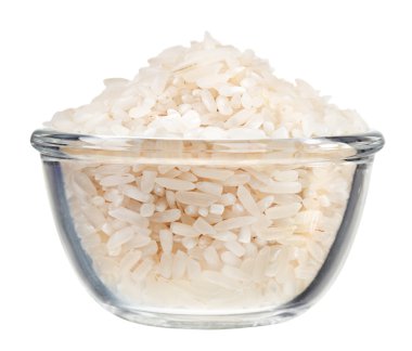 Polished long rice heap in small glass bowl, isolated on white clipart