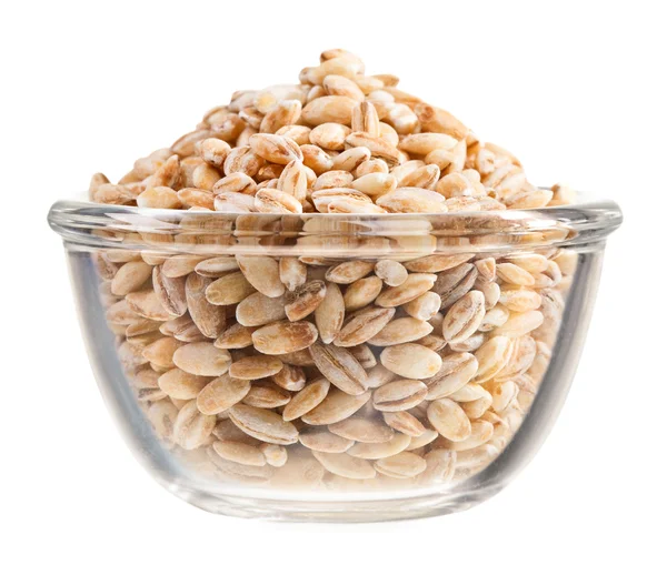 Pearl barley heap in small glass bowl, isolated on white — Stock Photo, Image