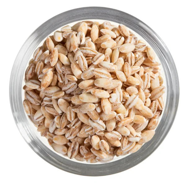 Pearl barley heap in small glass bowl, isolated on white — Stock Photo, Image