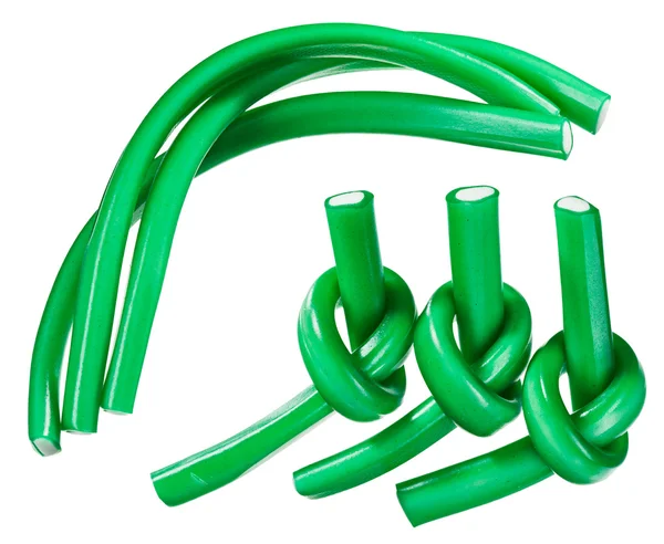 Conjunto de cuerda de caramelo gomoso verde (regaliz), aislado en primer plano blanco —  Fotos de Stock