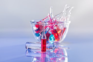 Medical ampules still life in vivid violet colors clipart