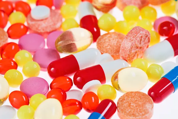 Piller, tabletter och läkemedel, medicinsk bakgrund — Stockfoto