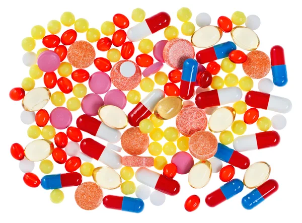 Pilules, comprimés et médicaments, fond médical isolé — Photo