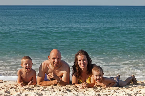 Family on sea beach — Stock Photo, Image