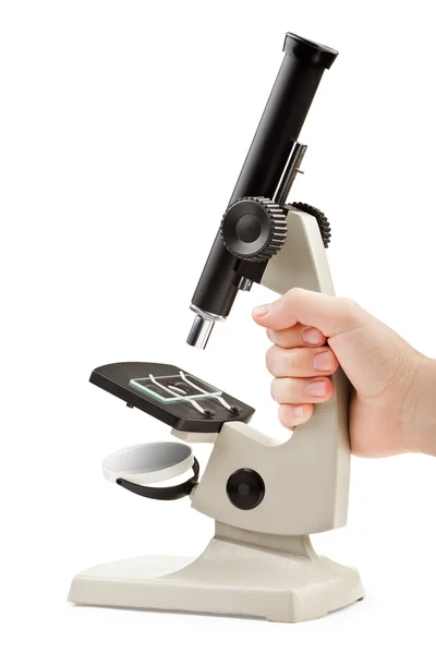 Hand innehav mikroskopet — Stockfoto