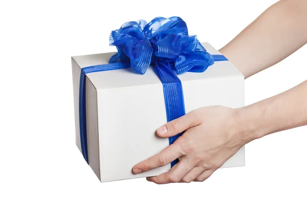 stock image Human hand holding gift or present box