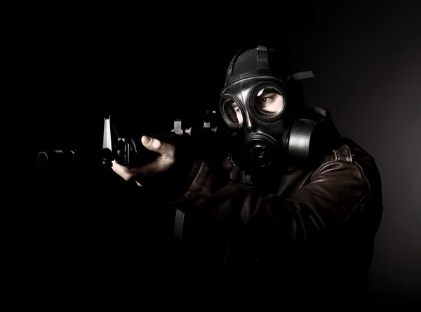 Terorista s plynovou masku — Stock fotografie