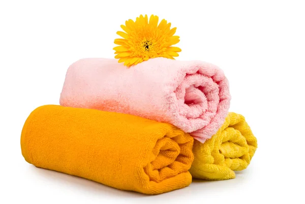 Handdoeken en bloem Stockafbeelding
