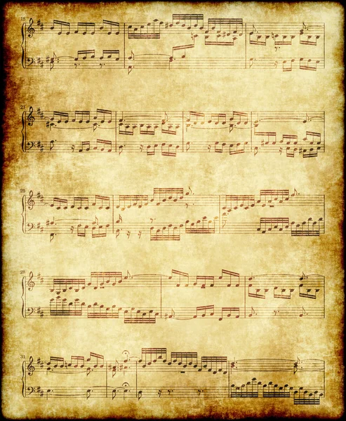 Notas musicales sobre papel viejo — Foto de Stock