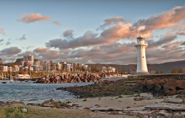 Lighthouse sunrise at wollongong clipart