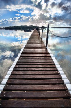 Long pier into water clipart