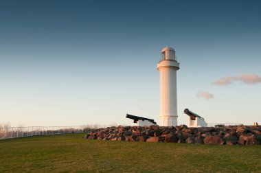 Lighthouse and cannons at wollongong clipart