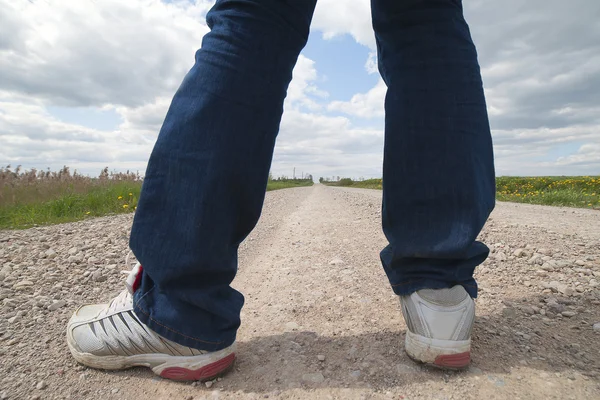 stock image Legs on road.