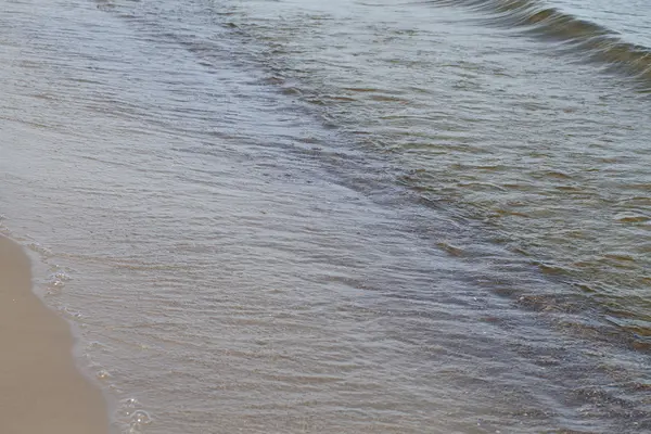 stock image Wave on sand.