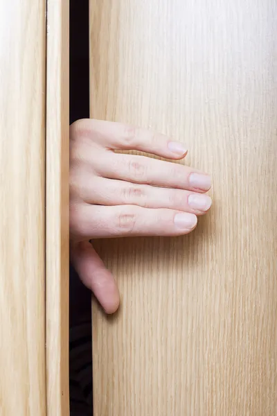 Χέρι και την πόρτα. — Φωτογραφία Αρχείου