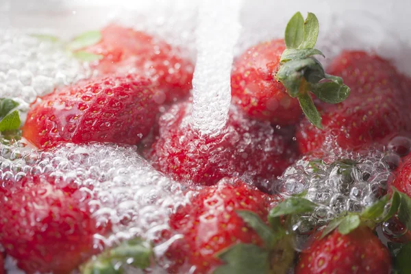 stock image Strawberries and water.