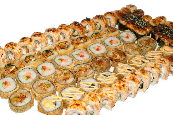 Hot sushi and sushi rolls — Stock Photo, Image